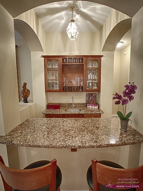 Luxurious Zajac Interiors Heathrow Home Kitchen Area with Butler Corner Featured by Wine Cellars and Sink