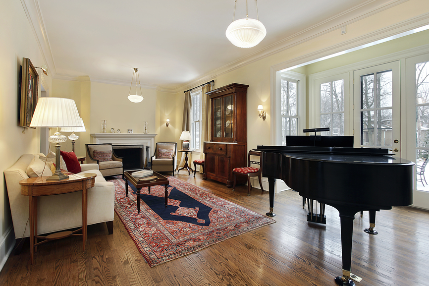 Living room with large piano