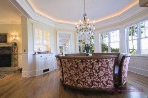 Chic-Trey-Ceiling-technique-Burlington-Traditional-Dining-Room-Inspiration-with-banquette-built-ins-cabinet-crown-moulding-crystal-chandelier-dining-hutch-floral-round-dining-table