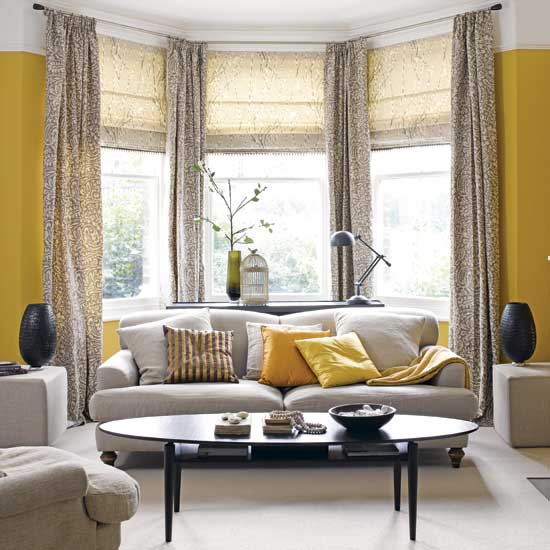yellowgreylivingroomwithbaywindowviaapartmentsilike